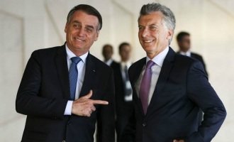 Envuelto en escándalos de corrupción, Bolsonaro se suma a la campaña electoral de Macri